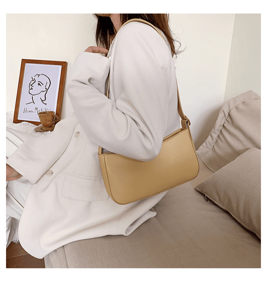 Our best seller: the 90s Mini Baguette Handbag.